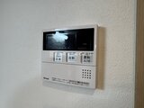 コンフォリア高島平 温水便座と浴室乾燥機能付きのリモコンパネル