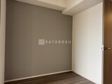 スタイリオ池上サウス グレーとアイボリーの配色で落ち着いた印象の洋室