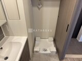 スタイリオ池上サウス 洗面台と洗濯機置き場が隣接した清潔感のある水回り空間