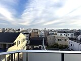 スタイリオ池上サウス バルコニーから見た住宅地と街並みの風景