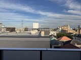 スタイリオ池上サウス バルコニーから見た開放的な街並みと青空の景観