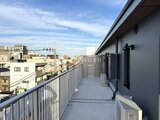 スタイリオ池上サウス 都市風景を見渡すモダンなテラスバルコニー