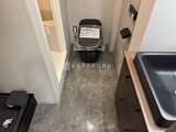 エクサム赤坂 モダンな濃色タイルの落ち着いたトイレ空間