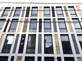 グランパセオ三宿2 モダンなデザインの建物外観、整然と配置された窓