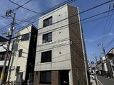 RAMIi板橋大和町 前面道路から見たモダンな外観の建物