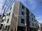 RAMIi板橋大和町 前面道路から見たモダンな外観の4階建て建物