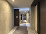 ヴィスタコート幡ヶ谷 コンクリート打ちっ放しの落ち着いた廊下空間