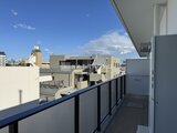 ヴィスタコート幡ヶ谷 バルコニーから見た周辺建物と青空が広がる眺望