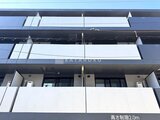 ラヴィエール住吉駅前 モダンなバルコニーを備えた建物の外観