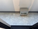 ラヴィエール住吉駅前 玄関を入った落ち着いたトーンのエントランスホール