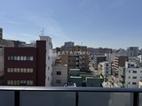 グランクレイエル両国 バルコニーから見た街並みと青空が広がる眺望