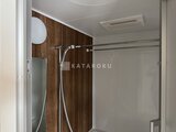 ルミーク大森 木目調パネルを使用した落ち着いた印象のシャワールーム