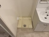 タスキスマート新大塚3 洗濯機置き場と洗面台が隣接した明るい洗面スペース