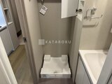 ラヴィエール新板橋 洗濯機置き場とサンルームを備えた動線のよい洗面脱衣室