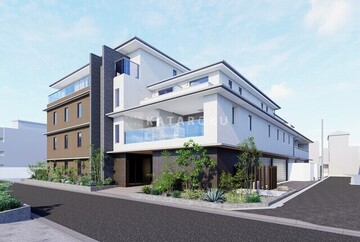 モクシオンプレミアム四谷大京町 開放的なバルコニーを備えたモダン建築の外観