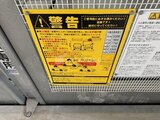 アーバネックス両国レジデンス 駐車場の注意事項を記載した警告板