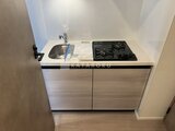ガーデンザヴィス門前仲町 シンクとガスコンロが備わったコンパクトなキッチン