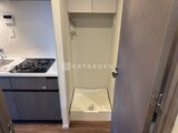 ラティエラ武蔵小山レジデンス キッチンと洗濯機置き場が隣接したコンパクトな空間