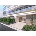 アイフラット阿佐ヶ谷 モダンなデザインのエントランスと植栽に囲まれた開放的な外観