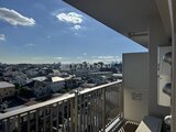 パークアクシス大森山王 開放的なバルコニーから街並みと青空が広がる眺望