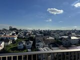 パークアクシス大森山王 バルコニーから見た住宅街と都市景観を望む眺望