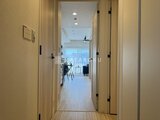 パークアクシス大森山王 廊下から見たリビングダイニング方向の開放的な空間