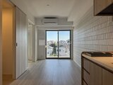 パークアクシス大森山王 明るい光が差し込むリビングダイニングから眺望が広がる空間