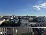 パークアクシス大森山王 バルコニーから見た周辺の住宅街と青空が広がる景観