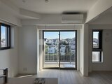 パークアクシス大森山王 開放的なバルコニービューを取り込む明るいリビングダイニング