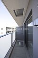 アリビス綾瀬 バルコニーから見た建物の軒下と隣棟の様子