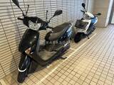 HF南麻布レジデンス 屋内駐輪場に並ぶ複数台のスクーター