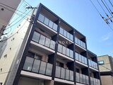 クリオラモード学芸大学2 前面道路から見たモダンな造りの建物外観