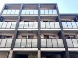 クリオラモード学芸大学2 整形されたバルコニーが並ぶモダンな建物の外観