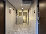 デュオメゾン西新宿 共用廊下から見たエレベーターホール