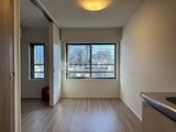 デュオメゾン西新宿 大きな窓から光が入る開放的なリビングダイニング