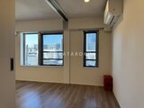 デュオメゾン西新宿 大きな窓から市街地の眺望が広がる明るいリビング空間